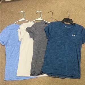 Under Armour women’s Blue and Gray Short Sleeve Tees